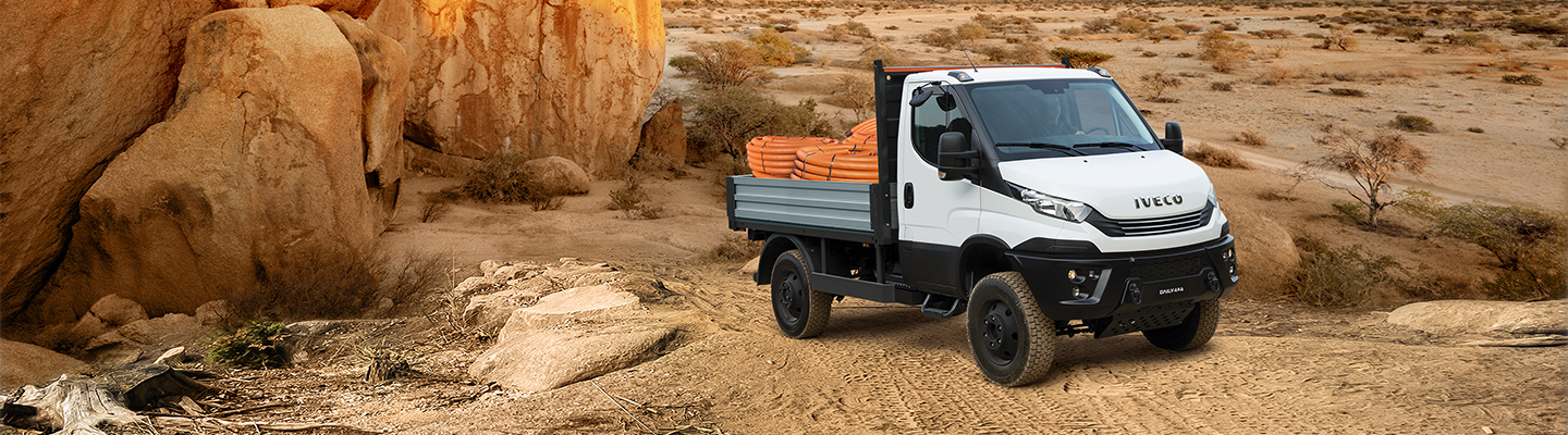 White Iveco Daily 4x4 dropside in the bush